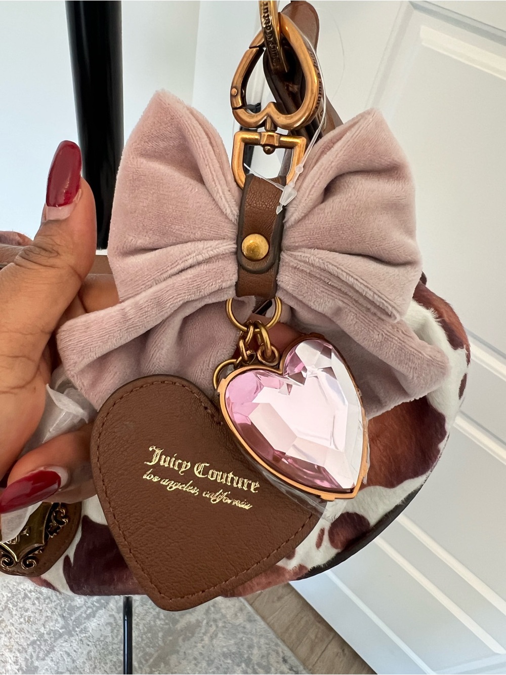 Juicy Couture Brown & White Cowhide Print Shoulder Bag with Heart Charm & Bow - Picture 4 of 6